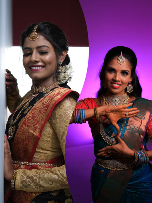 Both womens are dressed in traditional Indian clothing where they are dressed up beautifully, possibly for a celebration like a wedding or a party. Their hands have henna designs, and they are holding her hands in a graceful pose, like a dance move.